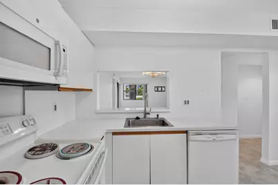 7665 Tahiti Lane #104, Lake Worth, FL 33467 - Photo 19