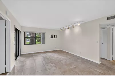 7665 Tahiti Lane #104, Lake Worth, FL 33467 - Photo 9