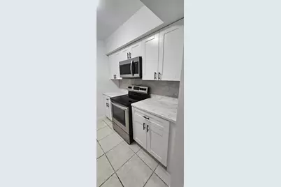 12005 Poinciana Boulevard #102, Royal Palm Beach, FL 33411 - Photo 27