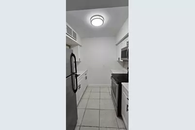 12005 Poinciana Boulevard #102, Royal Palm Beach, FL 33411 - Photo 25