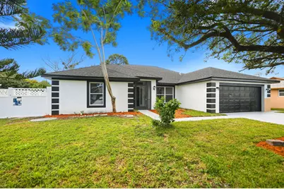 942 SW John Maccormack Terrace, Port Saint Lucie, FL 34953 - Photo 1