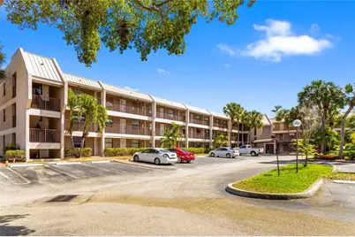 8751 Shadow Wood Boulevard #102, Coral Springs, FL 33071 - Photo 1