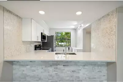 3507 Village Boulevard #105, West Palm Beach, FL 33409 - Photo 11
