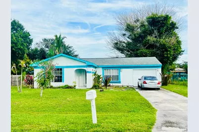 1475 SE Grapeland Avenue, Port Saint Lucie, FL 34952 - Photo 1
