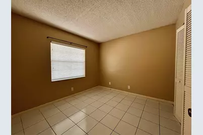 8820 Royal Palm Boulevard #109-4, Coral Springs, FL 33065 - Photo 11