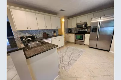 1315 SE Petunia Avenue, Port Saint Lucie, FL 34952 - Photo 13
