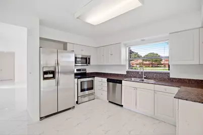 3705 SW Quail Meadow Trail #E, Palm City, FL 34990 - Photo 9