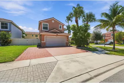 8064 Pelican Harbour Drive, Greenacres, FL 33467 - Photo 1