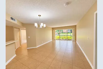 8741 Wiles Road #102, Coral Springs, FL 33067 - Photo 5