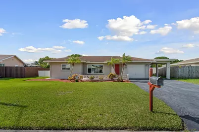 9704 NW 67th Street, Tamarac, FL 33321 - Photo 1
