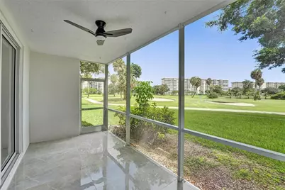 3900 Oaks Clubhouse Drive #107, Pompano Beach, FL 33069 - Photo 1