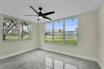 3900 Oaks Clubhouse Drive #107, Pompano Beach, FL 33069 - Photo 3