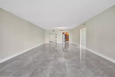 3900 Oaks Clubhouse Drive #107, Pompano Beach, FL 33069 - Photo 13