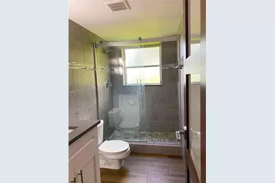 3900 Oaks Clubhouse Drive #106, Pompano Beach, FL 33069 - Photo 15