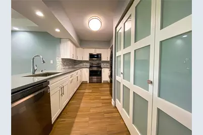 3900 Oaks Clubhouse Drive #106, Pompano Beach, FL 33069 - Photo 3