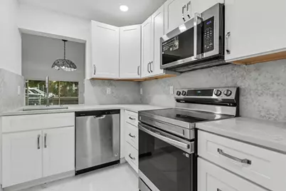 460 Paradise Isle Boulevard #101, Hallandale Beach, FL 33009 - Photo 9