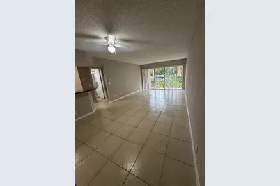 9001 Wiles Road #101, Coral Springs, FL 33067 - Photo 1