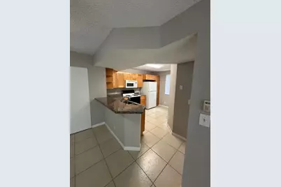 9001 Wiles Road #101, Coral Springs, FL 33067 - Photo 3