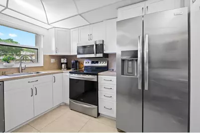 9330 Sunrise Lakes Boulevard #104, Sunrise, FL 33322 - Photo 1