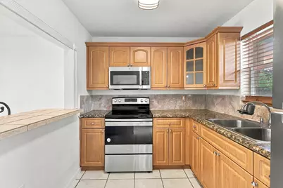 705 Lori Drive #102, Palm Springs, FL 33461 - Photo 3