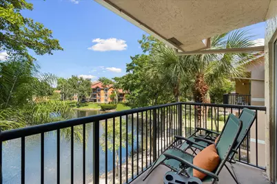 8701 Wiles Road #306, Coral Springs, FL 33067 - Photo 1