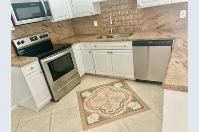 7045 Golf Pointe Circle #7045, Tamarac, FL 33321 - Photo 9