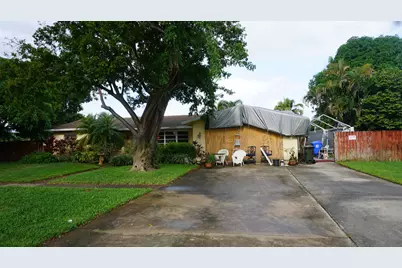 901 Palmetto Drive, Coconut Creek, FL 33066 - Photo 1
