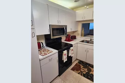 9655 N Belfort Circle #211, Tamarac, FL 33321 - Photo 13