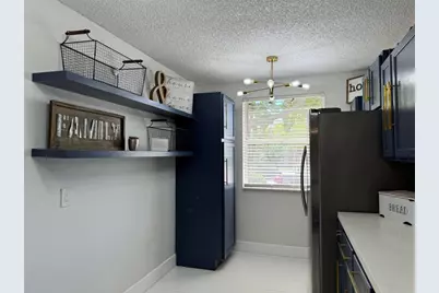 8891 Wiles Road #208, Pompano Beach, FL 33067 - Photo 3