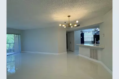 8891 Wiles Road #208, Pompano Beach, FL 33067 - Photo 15