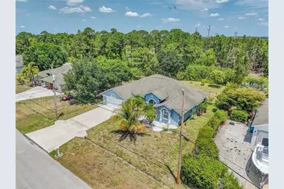 6107 NW Gause Avenue, Port Saint Lucie, FL 34986 - Photo 1