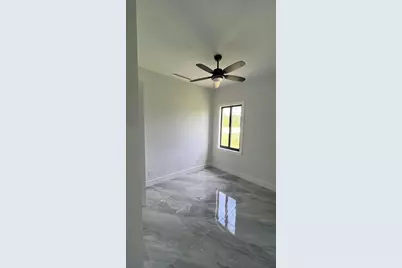 879 Sunrise Boulevard, Lehigh Acres, FL 33974 - Photo 13