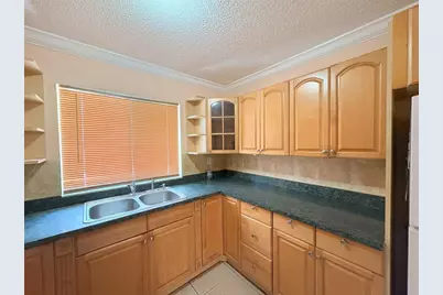 2760 W 62nd Place #203, Hialeah, FL 33016 - Photo 5