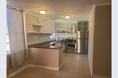 1700 NE 191st Street #100, Miami, FL 33179 - Photo 1