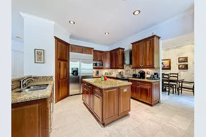 1673 Victoria Pointe Circle, Weston, FL 33327 - Photo 23
