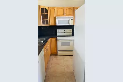 5111 W Oakland Park Boulevard #306, Lauderhill, FL 33313 - Photo 1