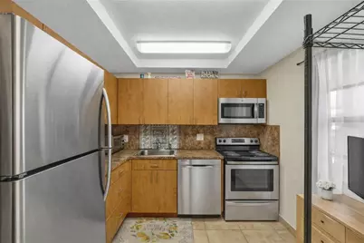 1015 Country Club Drive #203, Margate, FL 33063 - Photo 3