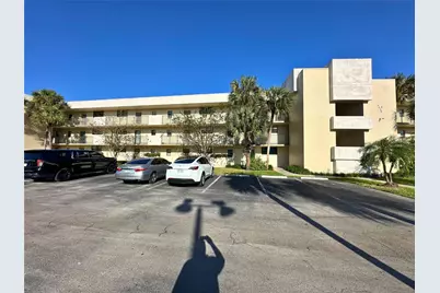 2420 Deer Creek Country Club Boulevard #306, Deerfield Beach, FL 33442 - Photo 11