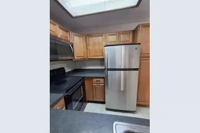 741 Lyons Road #17-106, Pompano Beach, FL 33063 - Photo 9