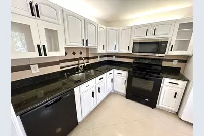 7931 Southgate Boulevard #E8, Pompano Beach, FL 33068 - Photo 1