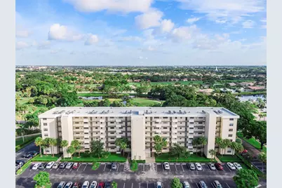 2400 Deer Creek Country Club Boulevard #202, Deerfield Beach, FL 33442 - Photo 1