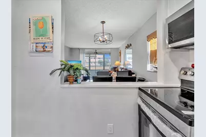 9041 Sunrise Lakes Boulevard #113, Sunrise, FL 33322 - Photo 13