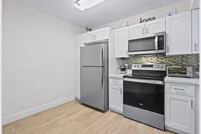 8851 S Wiles Road #305, Coral Springs, FL 33067 - Photo 1