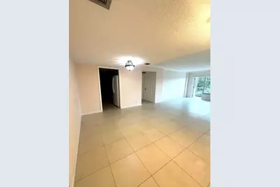 10777 W Sample Road #418, Coral Springs, FL 33065 - Photo 9