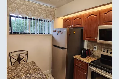 112 Lake Emerald Drive #208, Oakland Park, FL 33309 - Photo 7