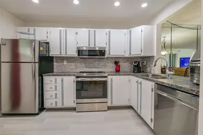 3930 Inverrary Boulevard #407-D, Lauderhill, FL 33319 - Photo 9