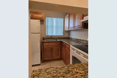 8590 Sunrise Lakes Boulevard #106, Sunrise, FL 33322 - Photo 3