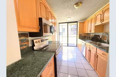 3590 Blue Lake Drive #104, Pompano Beach, FL 33064 - Photo 5