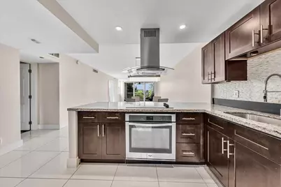 3520 Oaks Way #306, Pompano Beach, FL 33069 - Photo 3