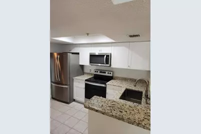 5041 Wiles Road #105, Coconut Creek, FL 33073 - Photo 1